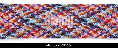 A braid of multi colored sewing threads on a white background Stock Photo