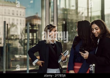 Female coworkers together Stock Photo