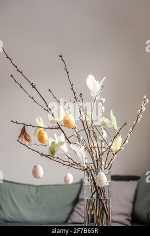 Twigs with hanging Easter eggs Stock Photo