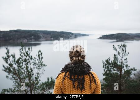 Woman looking at sea Stock Photo