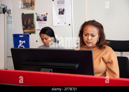 Two women working in office Stock Photo