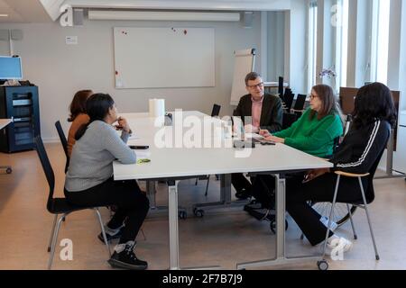 Disabled woman during meeting in office Stock Photo