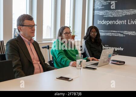 Disabled woman during meeting in office Stock Photo