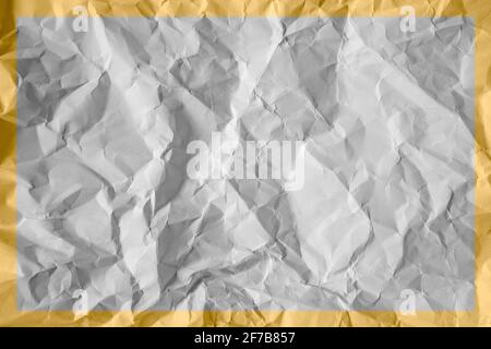 crumpled white paper with yellow frame Stock Photo