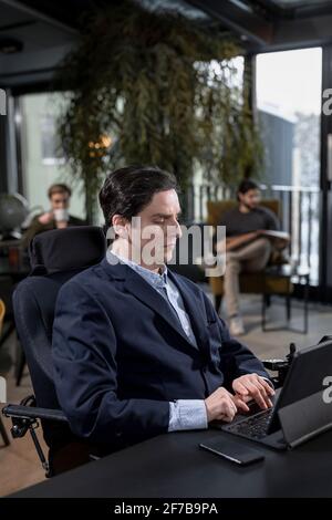 Businessman using digital tablet Stock Photo