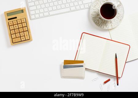 Coffee and notepad on desk Stock Photo