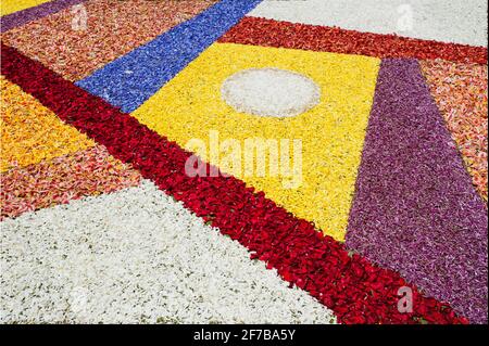 Abstract flower carpet, intricate handmade large size art covering streets and gardens, at the Corpus Christi or Body of Christ celebration, Tenerife Stock Photo