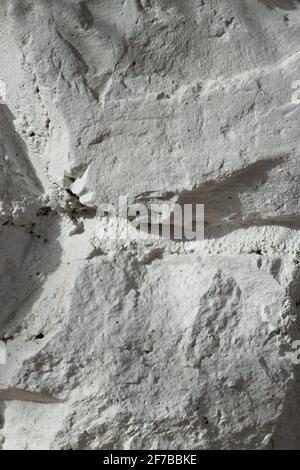 Whitewashed Rocks Washed stone wall background texture of wash gravel Stock Photo - Alamy