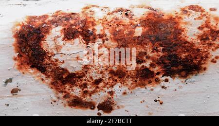 White painted surface with traces of rust and corrosion. Rust texture. Stock Photo