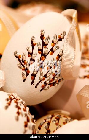hand painted willow branches on Easter eggs Stock Photo
