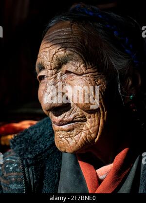 (210406) -- LHASA, April 6, 2021 (Xinhua) -- Photo taken on Jan. 14, 2021 shows a portrait of Dacho in Lalho Township, Saga County of Xigaze, southwest China's Tibet Autonomous Region. Dacho, born in 1929, is a resident in Lalho Township, Saga County of Xigaze, southwest China's Tibet Autonomous Region. She was made a serf in her early childhood and had suffered an unimaginable ordeal until the democratic reform in 1959.'The serf owner kept a roster listing dates of birth of all local residents, who would be made serfs at certain age, regardless of gender or health condition,' Dacho recalled, Stock Photo