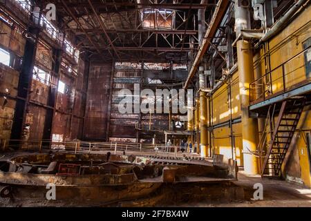 Stepnogorsk, Kazakhstan - April 04, 2012: Demolition of outdated Soviet sulfuric acid plant industrial building. Inside view. Stock Photo