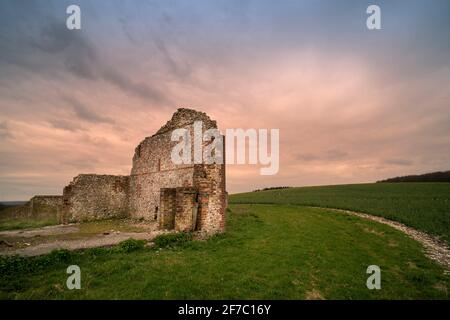 Old ruin of a flint and brick barn in the Sussex Countryside. Stock Photo