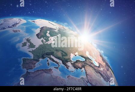 Sunrise through clouds, upon a high detailed satellite view of Planet Earth, focused on Western Europe - Elements furnished by NASA Stock Photo