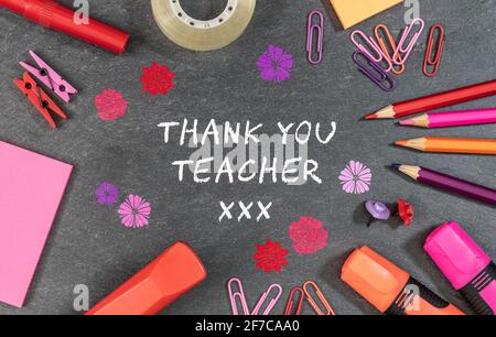 Thank you teacher text background with colorful school supplies. Stock Photo