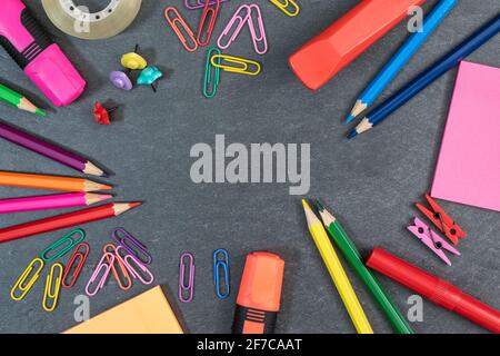 Border Frame of Colored School Object on Grey Background Stock Photo