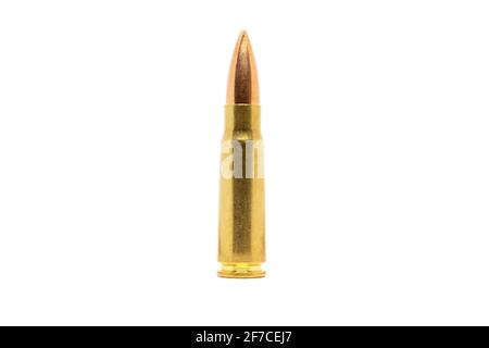 One bullet isolated on white background. Cartridge 7.62 caliber for Kalashnikov assault rifle closeup Stock Photo