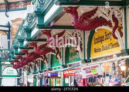 Ornate cast iron dragon decoration inside the 1904 hall of Kirkgate Market in the city of Leeds, West Yorkshire Stock Photo