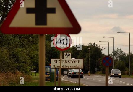 THE ENTRANCE TO SILVERSTONE VILLAGE. PILSTON Stock Photo