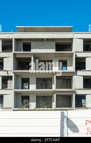 Concrete building under construction, apartments being built in Portimao, Portugal. Stock Photo