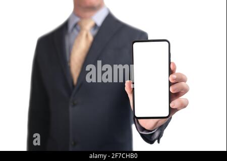 businessman showing phone. Businessman shows cell phone with blank screen. Man hold smart mobile cell phone with blank white screen. isolated on white Stock Photo