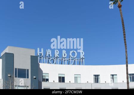 ANAHEIM, CALIFORNIA - 31 MAR 2021: Harbor Lofts sign atop the modern Condominium complex in the downtown Ctr City area. Stock Photo