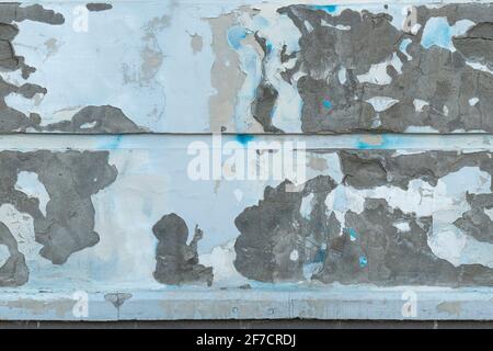 Seamless white wall with peeling plaster Stock Photo