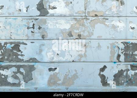 Seamless white wall with peeling plaster Stock Photo