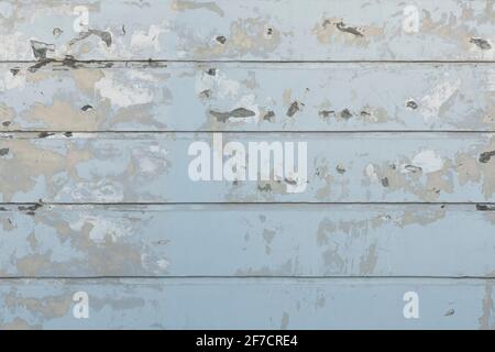 Seamless white wall with peeling plaster Stock Photo