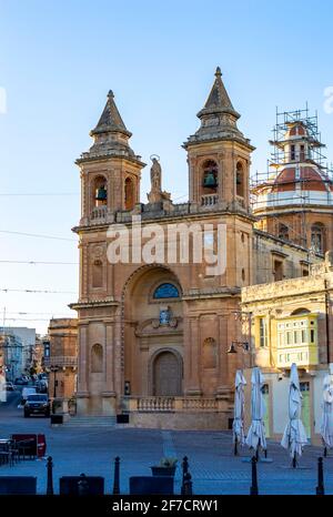 Marsaxlokk, Malta, Feb 28, 2020. Malta Marsaxlokk Parish Church during the sunset. Stock Photo