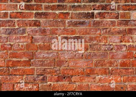 Old Red Brick wall background variety of bricks brick wall made with old bricks reclaimed bricks High resolution high quality photo Stock Photo