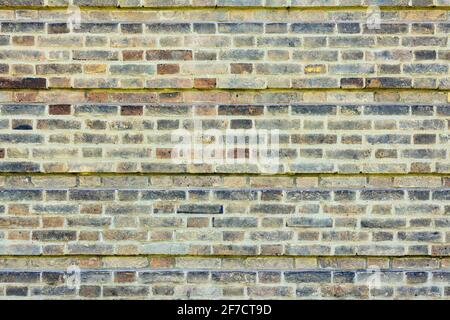 Patterned Brick wall background variety of bricks brick wall made with regular new house bricks High resolution high quality photo Stock Photo
