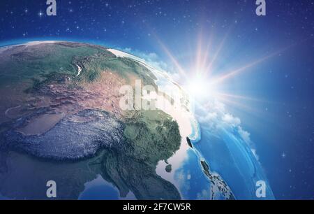 Sunrise through clouds, upon a high detailed satellite view of Planet Earth, focused on China, East Asia - Elements furnished by NASA Stock Photo