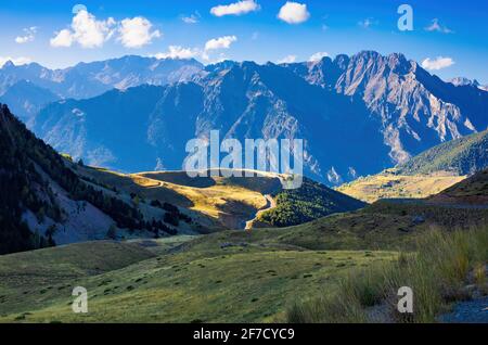 View of the Madaleta peaks from the road going up to the station of Apriu - Cerler, Aragon, Spain Stock Photo
