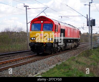 DB Cargo Class 66 Locomotive 66074 passes Northampton light engine on the West Coast Mainline Stock Photo