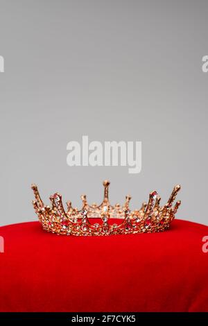 royal red velvet pillow with golden rope isolated over white background ...