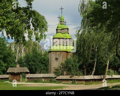 Wooden church in open-air Pyrohovo Museum of Folk Architecture in Kyiv, Ukraine Stock Photo