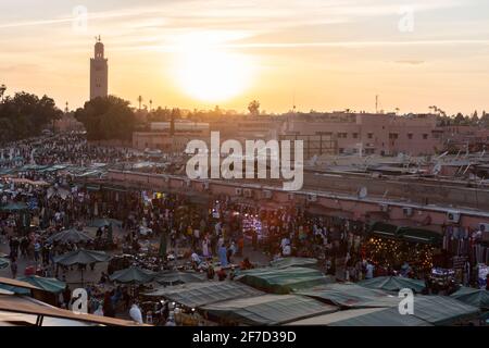 Djemaa el-Fna, the famous market in Marrakech at sunset - Traveling Morocco Stock Photo