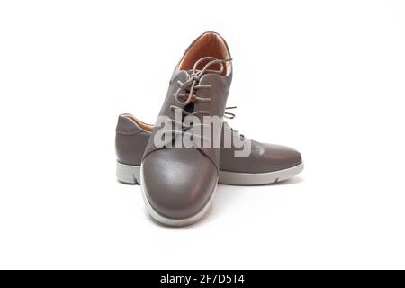 grey leather shoes isolated on a white background. Stock Photo