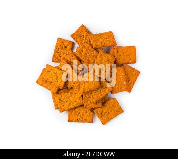 Tomato crackers with sea salt and spices isolated on a white background. The concept of snacks. Stock Photo