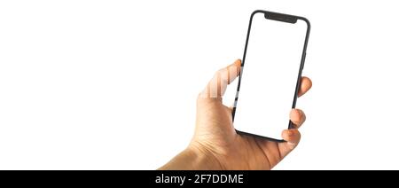 Kharkov, Ukraine - April 3, 2021: Mockup man using Apple iPhone 12, banner isolated on a white background, copy space photo Stock Photo
