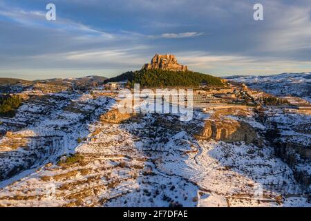 Morella medieval city aerial view, in a winter sunset, after a snowfall (Castellón province, Valencian Community, Spain) ESP: Vista aérea de Morella Stock Photo