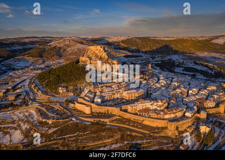 Morella medieval city aerial view, in a winter sunset, after a snowfall (Castellón province, Valencian Community, Spain) ESP: Vista aérea de Morella Stock Photo