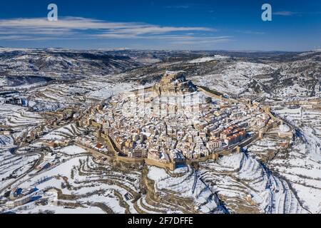 Morella medieval city aerial view, in winter, after a snowfall (Castellón province, Valencian Community, Spain) ESP: Vista aérea de Morella nevada Stock Photo