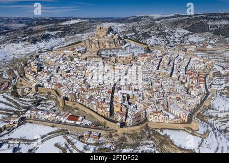 Morella medieval city aerial view, in winter, after a snowfall (Castellón province, Valencian Community, Spain) ESP: Vista aérea de Morella nevada Stock Photo