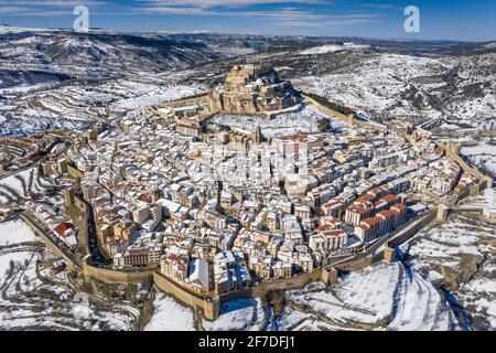 Morella medieval city aerial view, in winter, after a snowfall (Castellón province, Valencian Community, Spain) ESP: Vista aérea de Morella nevada Stock Photo