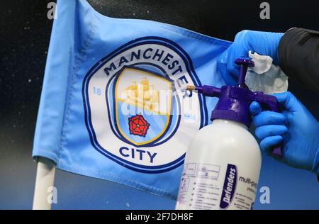 Manchester, UK. 06th Apr, 2021. Football: Champions League, Manchester City - Borussia Dortmund, knockout round, quarter-finals, first leg at Etihad Stadium. A corner flag with the Manchester City logo is disinfected before the match. Credit: Lindsey Parnaby/dpa/Alamy Live News