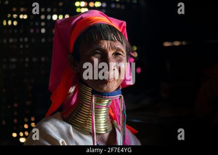 Kayan woman wearing traditional brass neck rings, near Loikaw, Myanmar Stock Photo