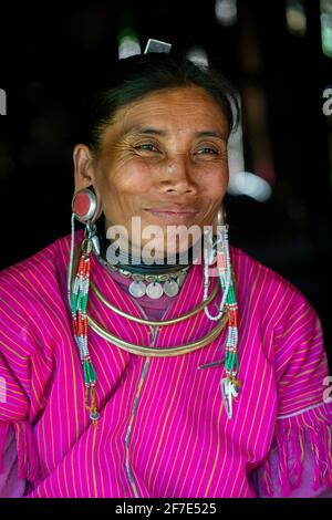 Portrait of smiling woman from Kayaw tribe, near Loikaw, Myanmar Stock Photo