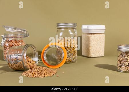 Still Life Scene of Various Pantry Items in Reuseable Containers Stock Photo